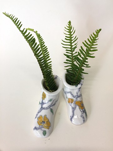 Yellow flowers on twisted branches painted by hand on porcelain shoes