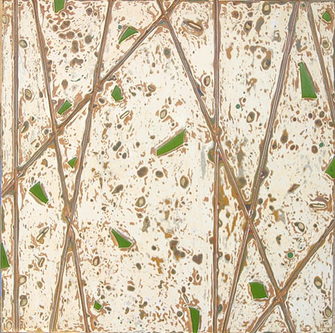 Copper and brown lines with green glass on top of a creamy tan background.  The pistachio seed marking is especially good in this piece.