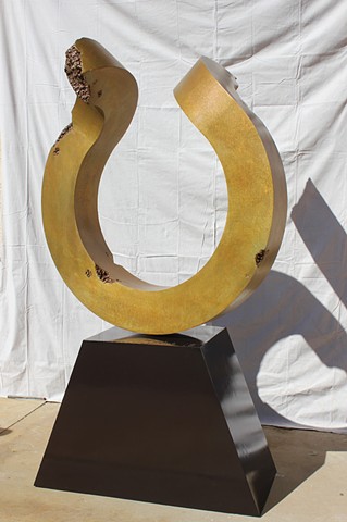 Patina on bronze with painted steel base. Free standing bronze sculpture.