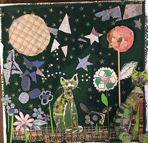 This is a collage assembled on packing foam. Paper and scrapes of cloth are glued and stitched onto a green table napkin.omposition.