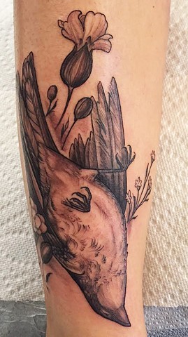 dead bird tattoo and flower