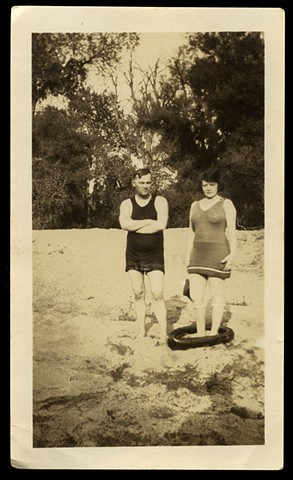 [couple in bathing costumes]