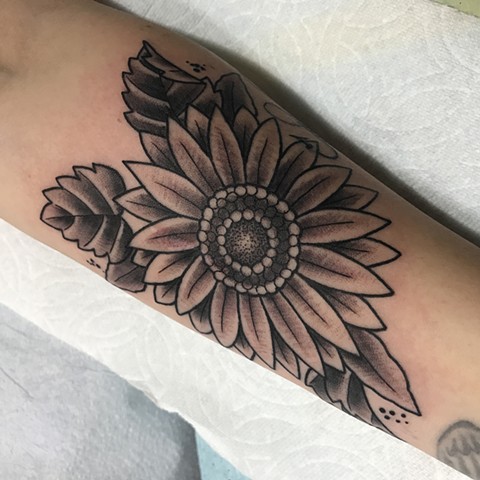 Floral sunflower made in a traditional tattoo style in Toronto Ontario Canada