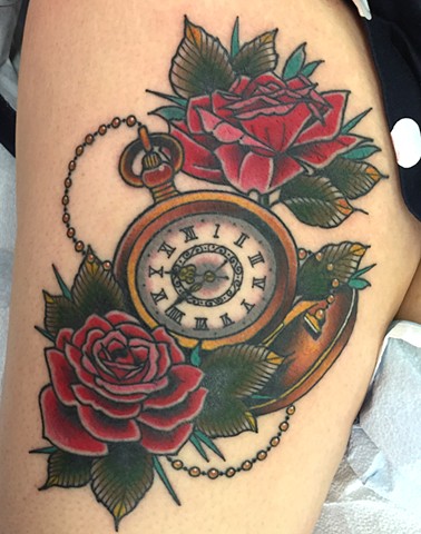 Pocket watch and roses made in Traditional tattoo style with bold colour on leg. Tattooed in Toronto.