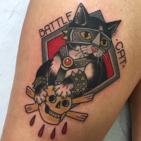 Neotraditional or Traditional Cat portrait tattoo, or cattoo, with heavy metal bold colourful style and a skull. Made in Toronto