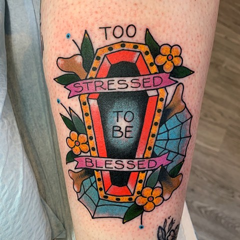 Traditional bold bright colour tattoo with coffin spider web by Jenny Boulger in Toronto Ontario