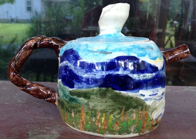 Teapot with landscape decoration