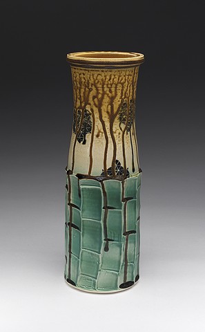 Tall porcelain vase, faceted with fake ash glaze