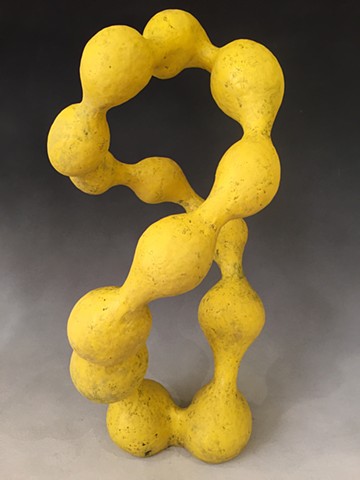 contemporary, abstract ceramic sculpture, flowing and colorful.