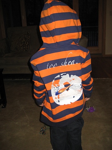 Aiden in a custom "too shea" hoodie. 