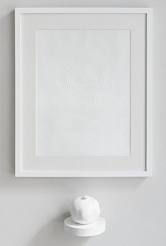 embossed print with round white shelf and pomegranate 