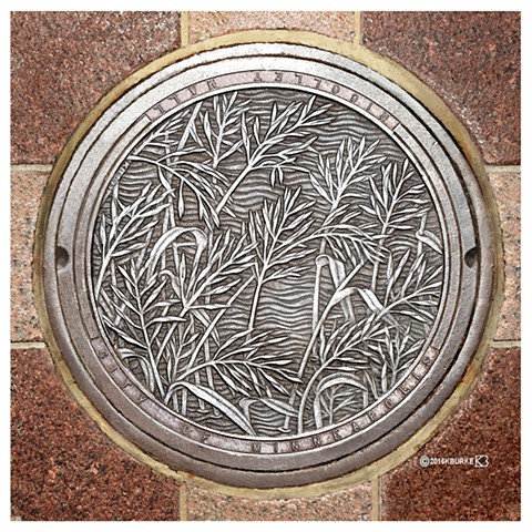 Manhole Cover on Nicollet Mall, Minneapolis MN. Commissioned by the City of Minneapolis, MN