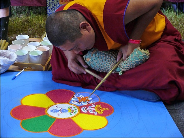 Tibetan Buddhists creating a Sand Mandala