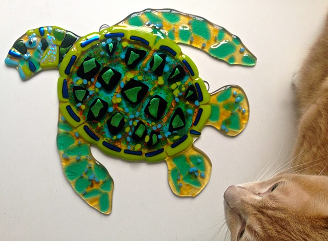 Small green sea turtle...

details:
about 12" long x 13" tall