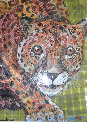large spotted cat rendered as a collage