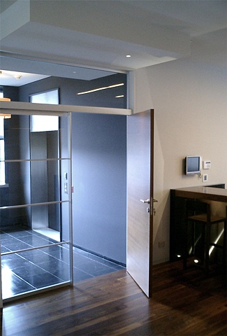 Washington Square Loft, modern, minimalist, entry vestibule, Poliform custom design doors lites by Doug Stiles Interior Design