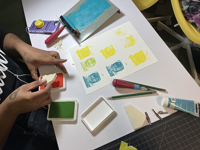 Mini-linocut stamps with adults at TWSH