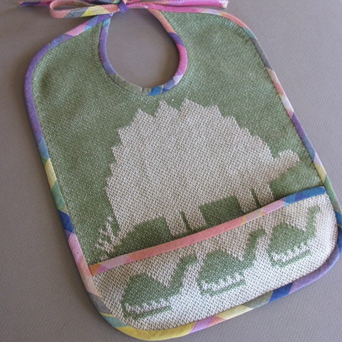 handwoven cotton baby or toddler bib, drawloom weaving by Kathie Roig