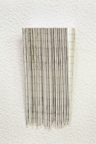 sculpture made with one hundred corners cut from one hundred invites to my show called hundreds of things volume 1