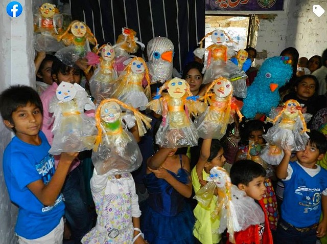 Creating art from trash-  dolls made from plastic bottles and polythene bags 