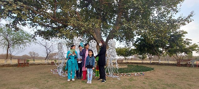 Installation'Tinfoil Mother Nature's Tribe'. Celebrated poet Kishwar Naheed was the guest of honour on the occasion of declaring an old banyan tree as a 'Natural Monument' by the Capital Development Authority.
