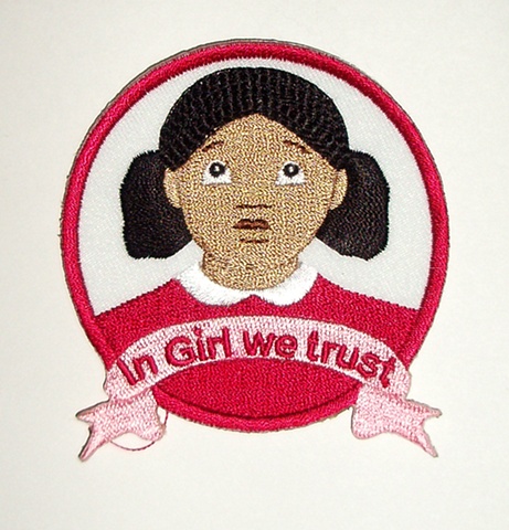 Badge featuring Girl's logo.  Can be sewn onto any fabric accessory or clothing.