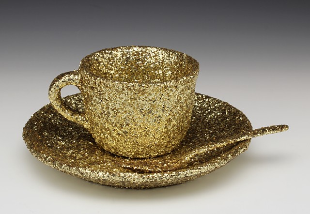 Meret Oppenheim's "Object" reimagined by a homosexual, in gold