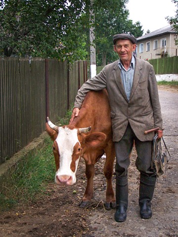Mykola and his cow Kalyna