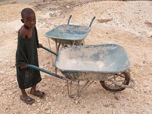 Boy with wheelbarrow