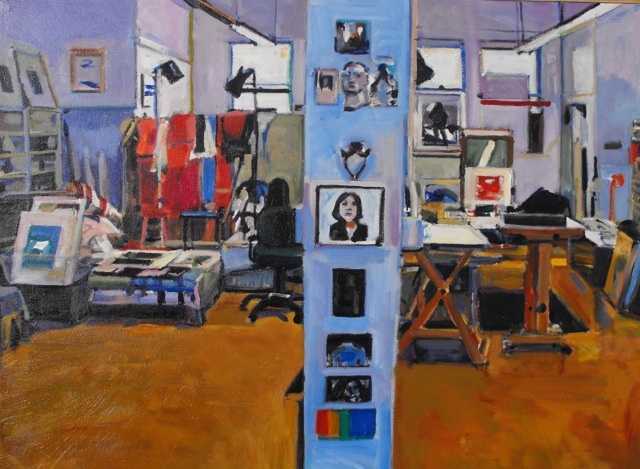 studio, painting, lights, rags drying, art work, center column, painting, drawing, black and white, blue walls, orange floor, tables, chairs