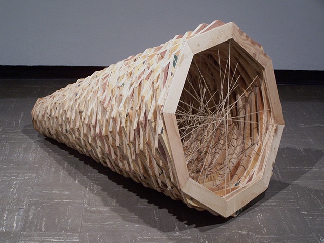 Untitled 2005, 36” x 57”, recycled plywood, wood glue, staples, jute
