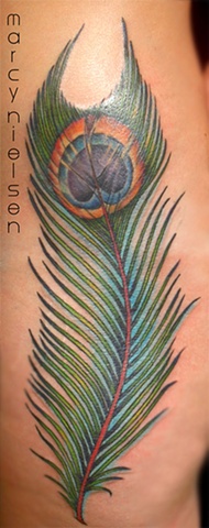 peacock feather tattoo on hip