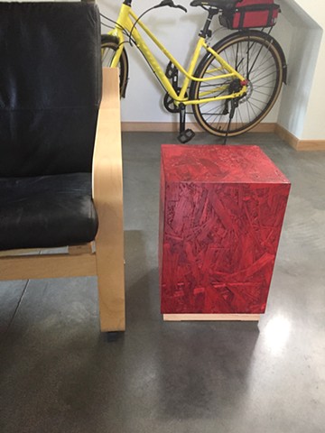 Modern OSB Pedestal table, red OSB finish.