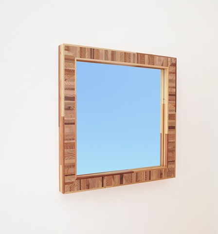 Handmade modern mirror with a multi-colored softwood frame; custom mirrors by Andrew Traub