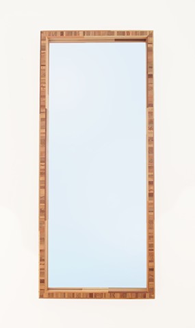 Modern end grain wood mirror made from scrap and salvaged wood with multicolored calico frame by Andrew Traub. Custom mirrors.