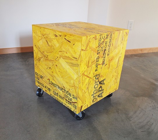 Modern osb furniture, cube table on casters made from yellow osb. Muse Cube table, handmade Andrew Traub Studio, Andy Traub