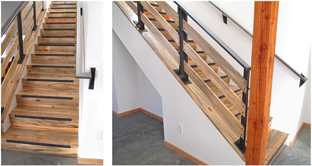 Stairs with a raw steel and blue pine railing, design and woodwork by Andrew Traub. Steel by Johnny Weld.