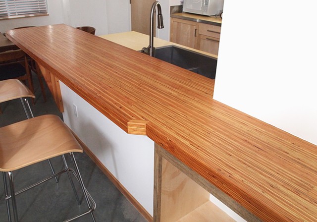 LVL wood bar counter with a rich tung oil blend finish 