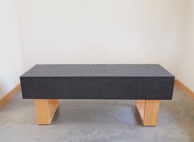 Modern OSB bench with cypress wood legs and black stained OSB.