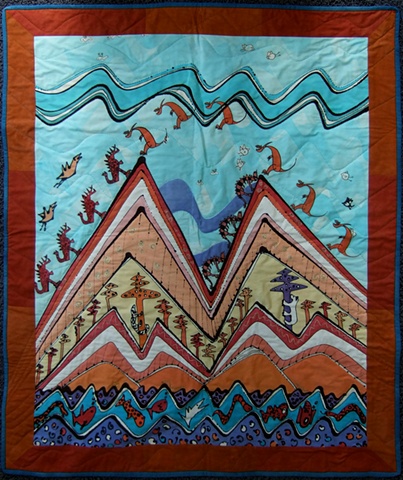 hand-painted quilt with dinosaurs and other animals climbing a mountain