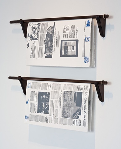 two copies on library newspapers sticks