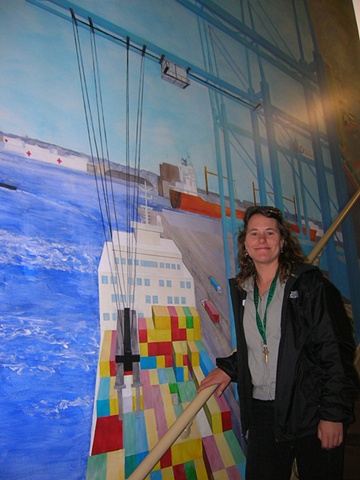 Artist in front of container ship