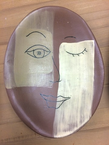 slab formed stoneware platter with slip and inlay decoration