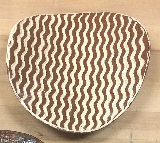 slab formed stoneware with slip inlay