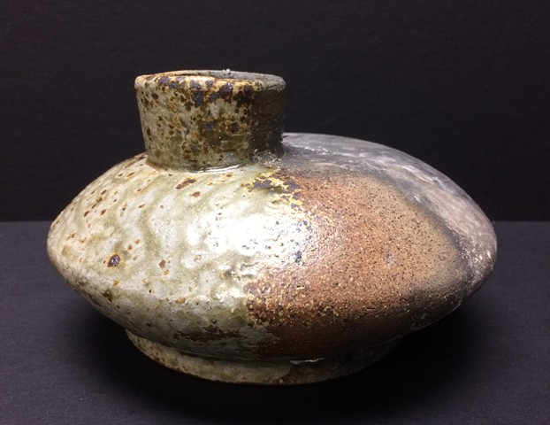 Thrown Bottle form fired in reduction with charcoal Injection