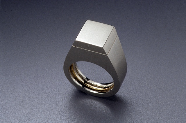 'Gents' Ring - with interior solitaire engagement ring (closed position)