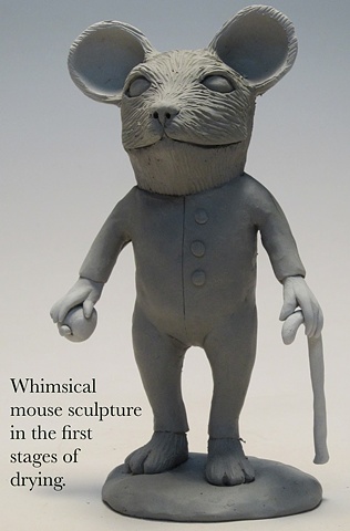 Drying decorative mouse sculpture.