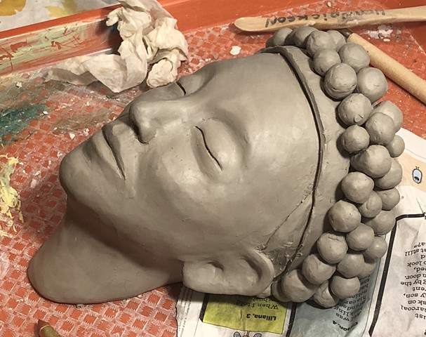 More clay faces in progress today.