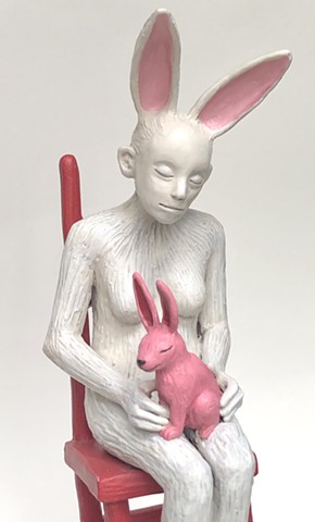 Rabbit woman (holding bunny toy).