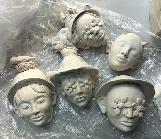 Paper clay wall pieces in progress.